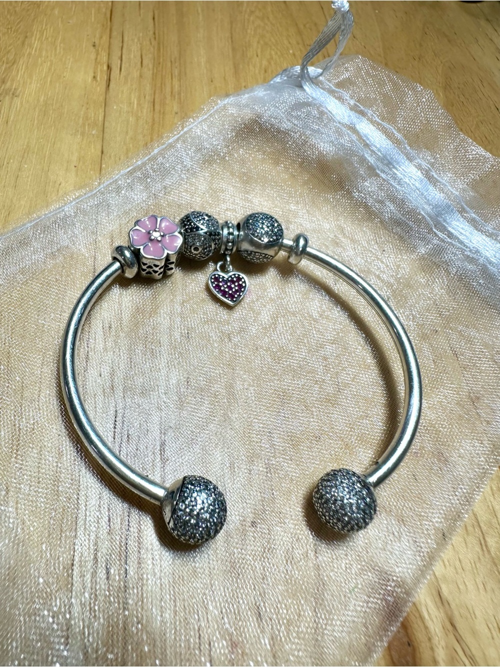 Pandora Silver Moment open bracelet with 2 stoppers and 4 Charms